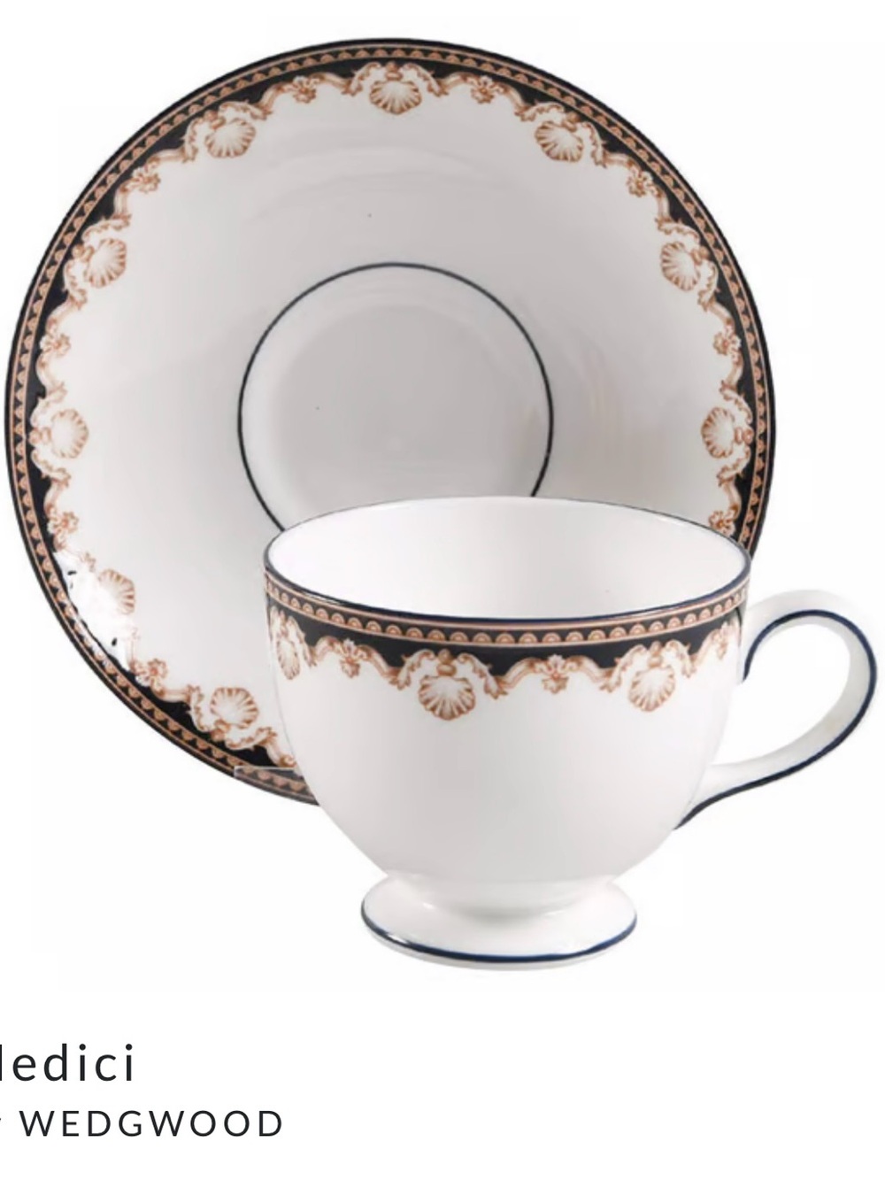 Wedgwood White Teacup and Saucer with Gold and Black Trim with tan sea shells